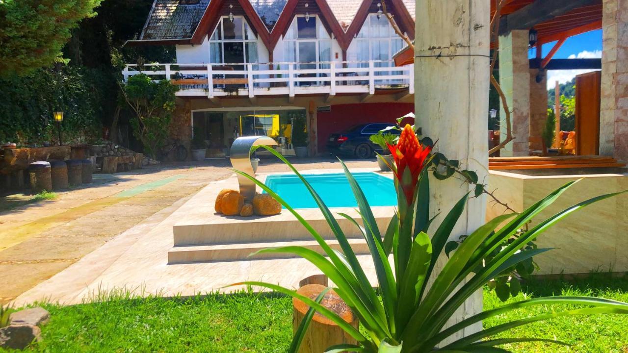 ホテル Campos House Campos do Jordão エクステリア 写真